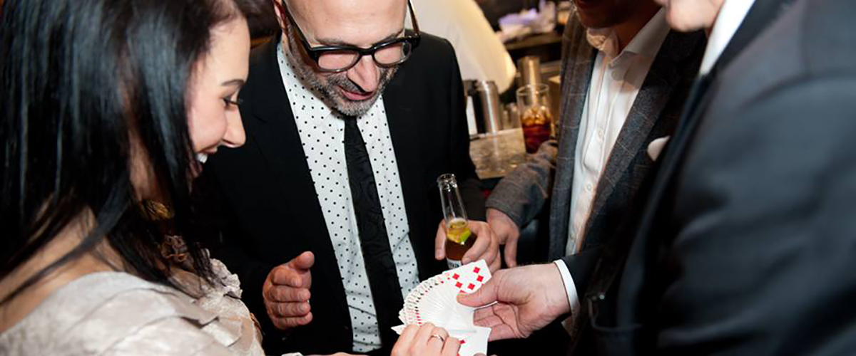 Wedding magician London — Roberto Forzoni performing intimate close-up magic